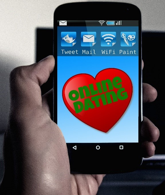 Phone screen displaying the words, 'Online dating'