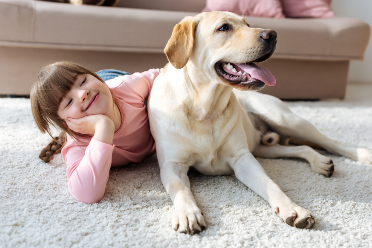 Young girl with dog.