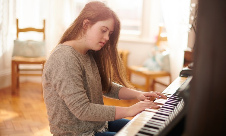 Girl playing a piano