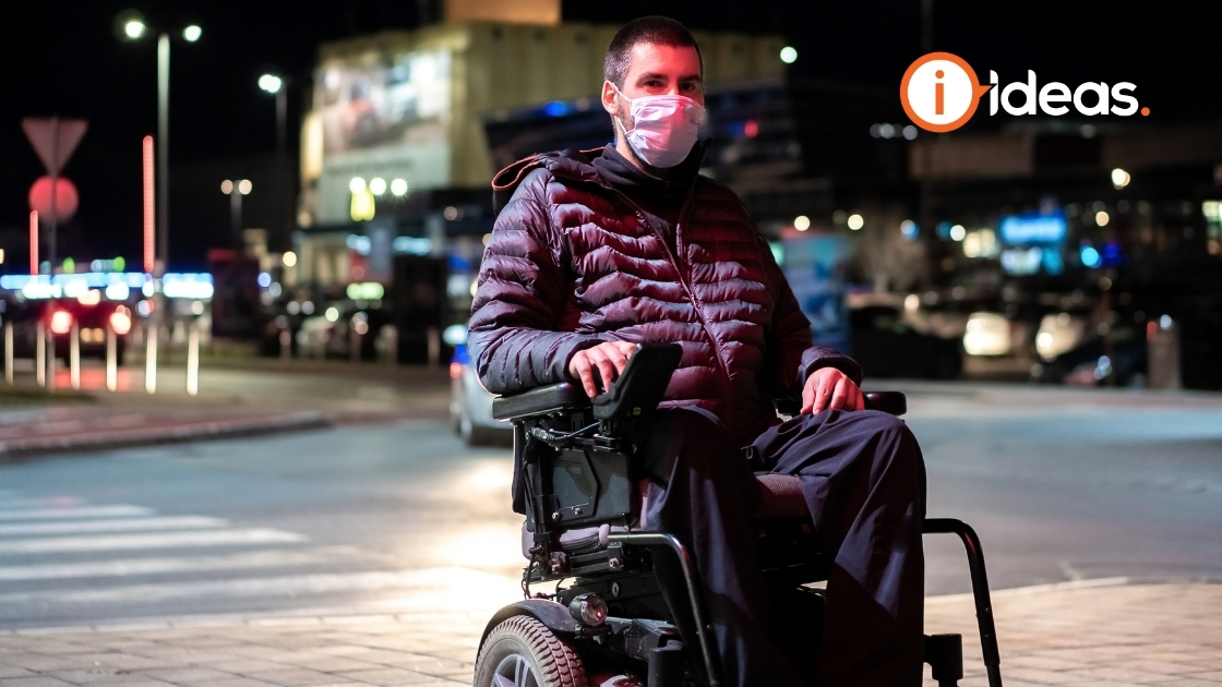 wheelchair user wearing a face mask