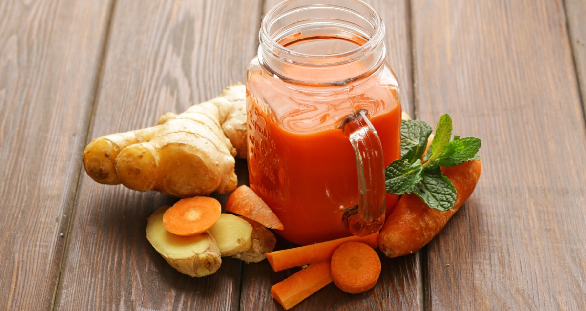 fresh carrot juice in a glass jar
