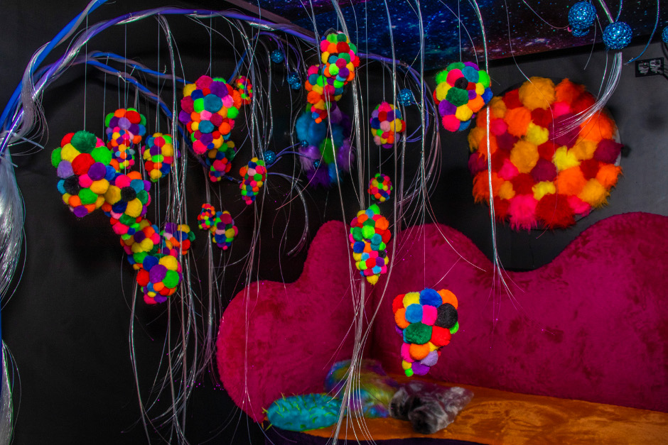 Image of a sensory room with tactile chair and hanging objects