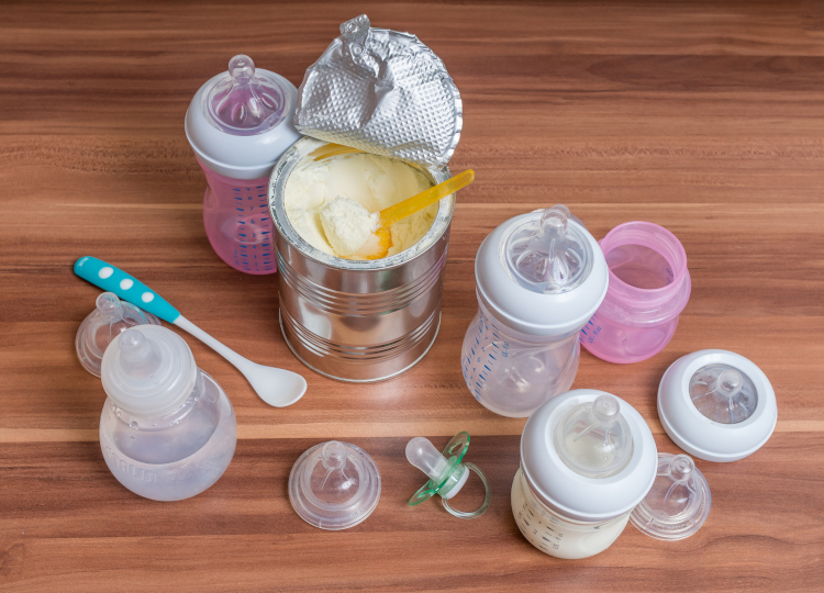 Image of Baby Formula, bottles and spoon