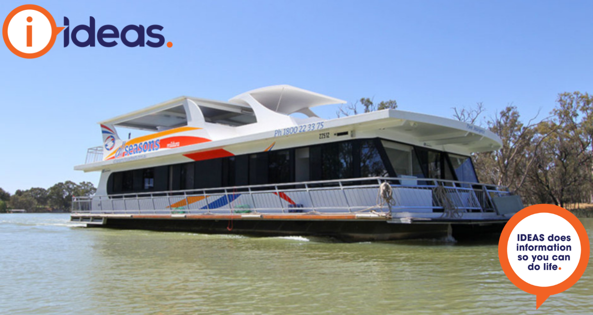 Image of a Houseboat on the water viewed from side on