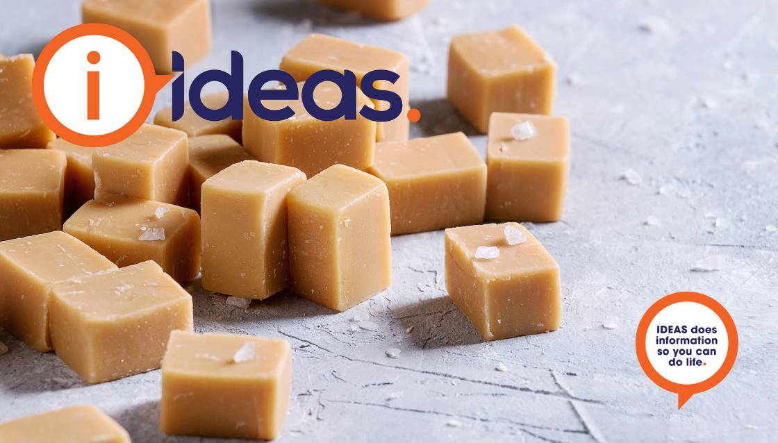 Squares of caramel coloured fudge with sea salt flakes.
