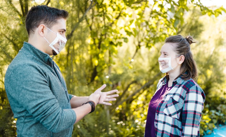 deaf and hard hearing young adults wearing clear face masks