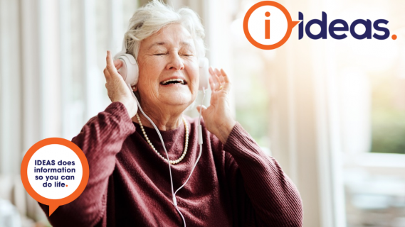 Image of elderly woman experiencing pleasure listening to headphones