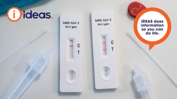 two rapid tests. one displays a control line and a positive test line, the other displays a control line and no test line