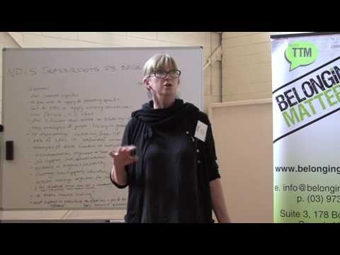 Lady standing in front of whiteboard speaking