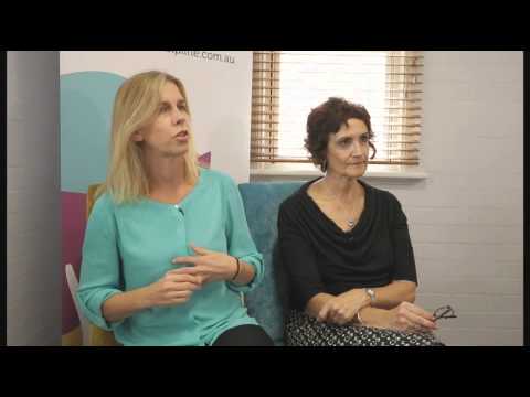 Two ladies sitting and talking