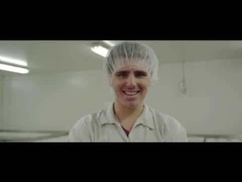 Young man with a food preparation cap on