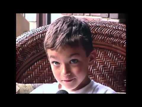 Young boy sitting in a chair