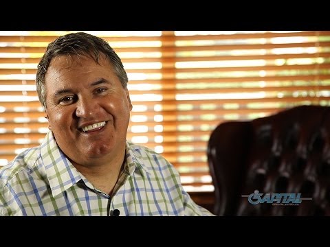 Man sitting in front of window