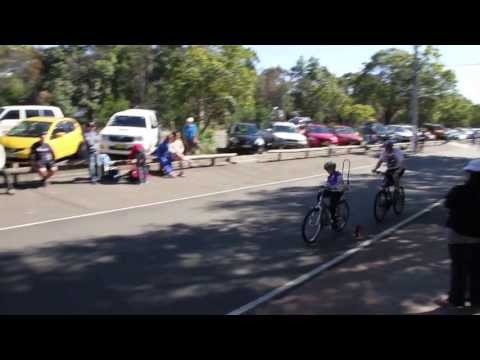 Man and boy riding bikes