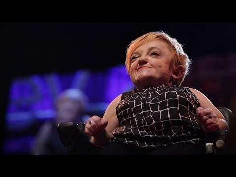 Stella Young on stage in her wheelchair