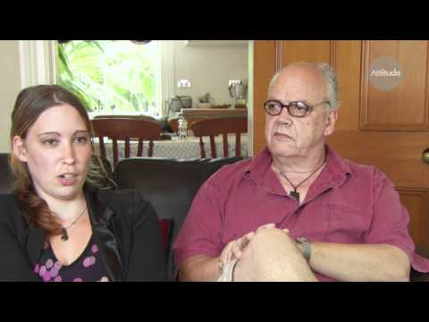 Father and daughter sitting on the lounge