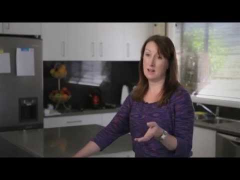 Lady standing in kitchen