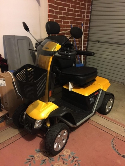 Yellow mobility Scooter