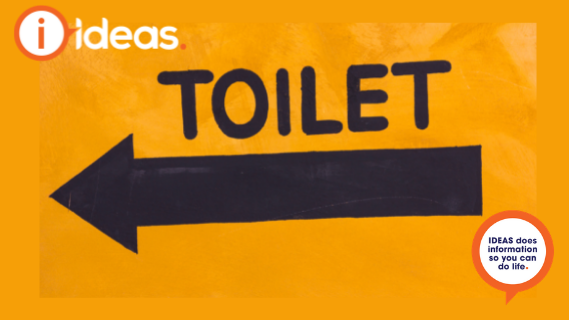 An orange background with a blue arrow and the word "toilet"