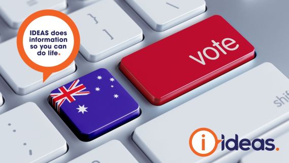 keys on a keyboard, one is an australian flag, the other is red and says vote.