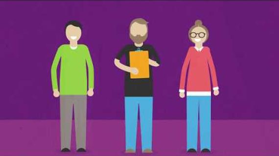 Picture of 3 people standing in a row with one person holding a folder