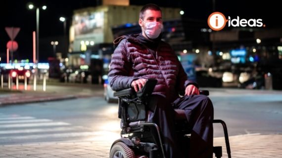 wheelchair user wearing a face mask