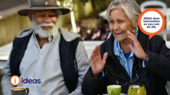 Image of 2 eldery Aboriginal and Torres Strait Islander People having a cup of tea.