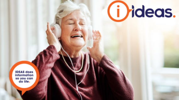 Image of elderly woman experiencing pleasure listening to headphones