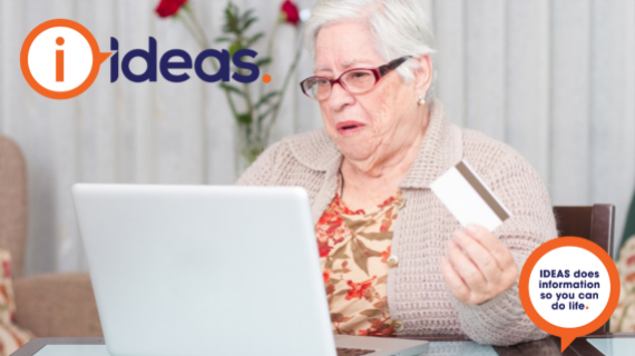 Senior lady doing online shopping using a laptop