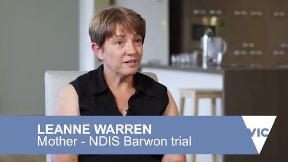 Lady sitting on a chair in her dinning room