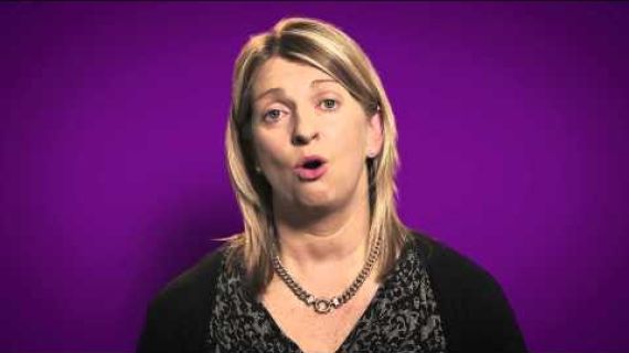 Image of a woman speaking with a purple background