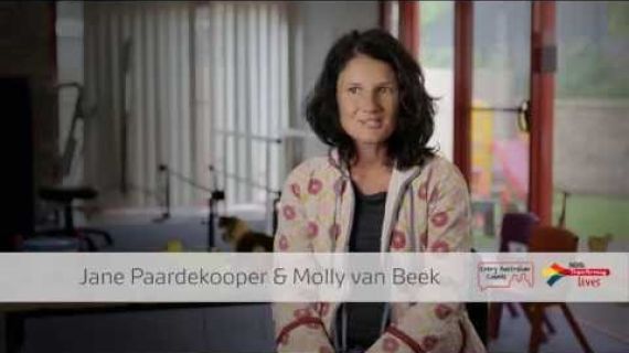 Picture of a woman sitting ready to speak