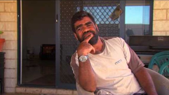 Man sitting on his back verandah