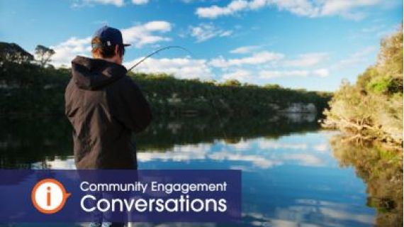 Young man fishing from the front of the boat in a inland river
