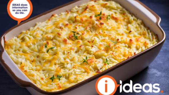 A casserole topped with mashed potato.