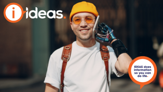 Young man on phone using AT to hold device up to his face