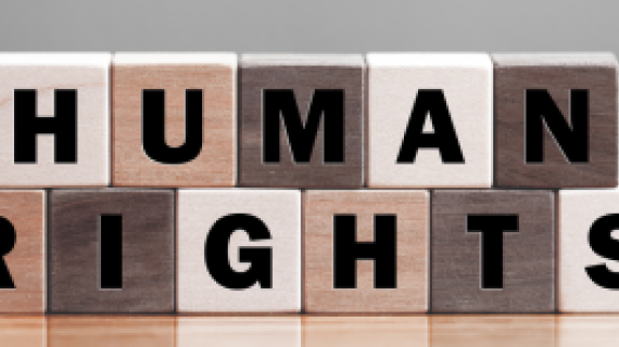 Blocks lined up that spell "human rights"