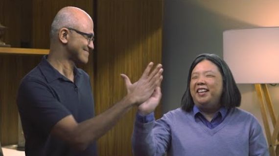 Man and woman hi fiving