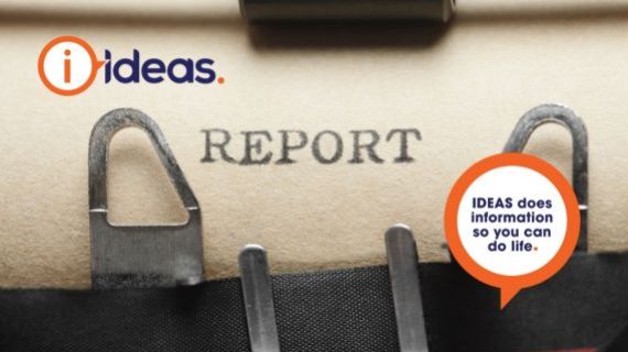 Typewriter with the word REPORT typed on paper