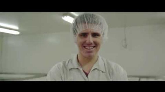 Young man with a food preparation cap on