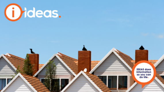 3 identical house roofs with a blue sky background