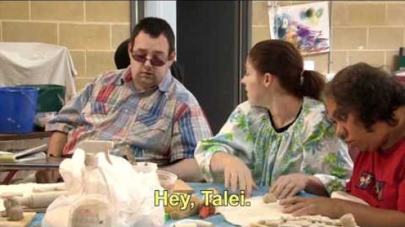 3 people working at a table