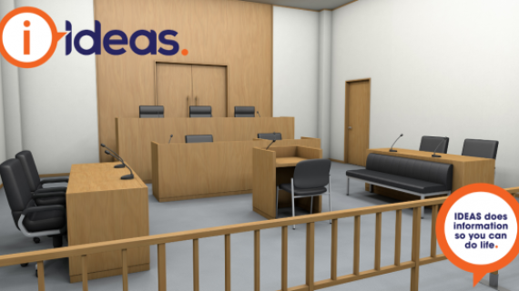 Image of an empty hearing room. There are chairs for the judge, witness and others.