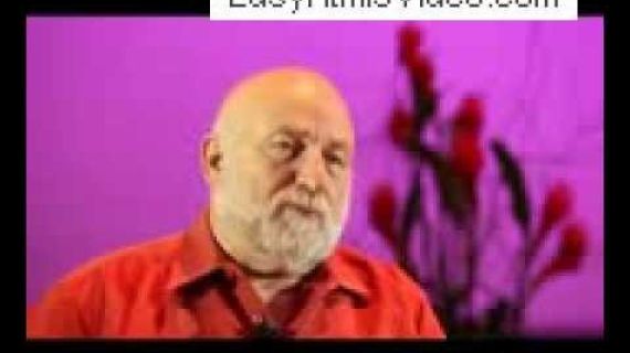 Man sitting with pink background