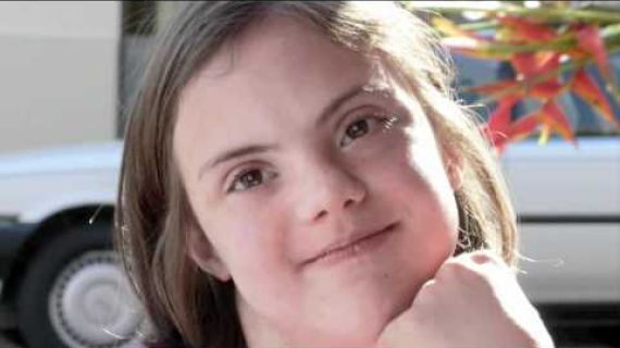 Young lady with hand on her chin
