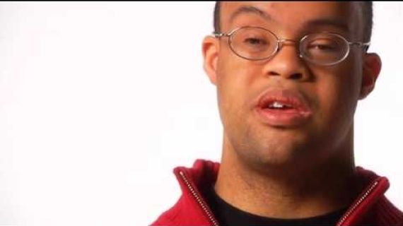 Man with glasses talking