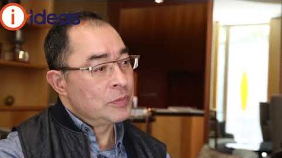 Picture of Martin sitting in an office speaking