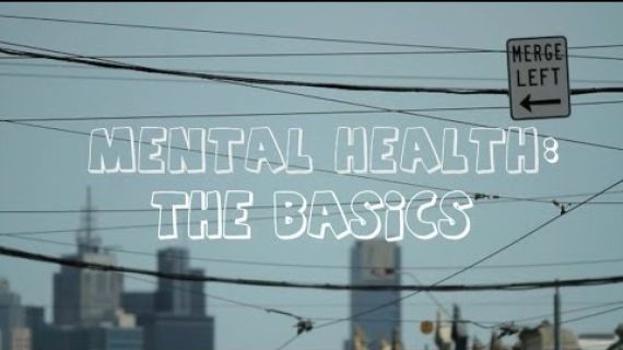 Mental Health the Basics written across a city skyline