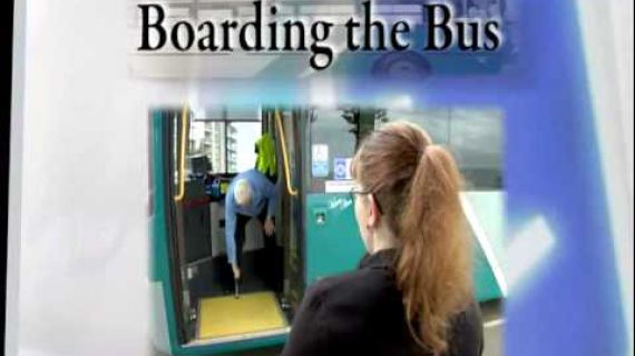 Boarding the bus and a lady in a wheelchair ready to board a bus