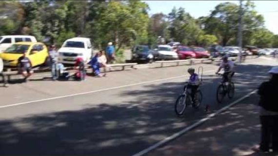Man and boy riding bikes